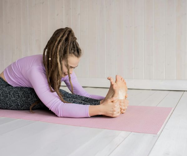 Woman doing gentle yoga stretch